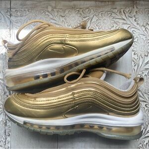 Nike Air gold sneakers size 7.5